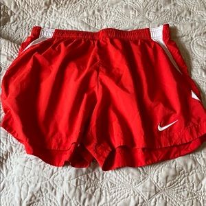 Red Nike shorts